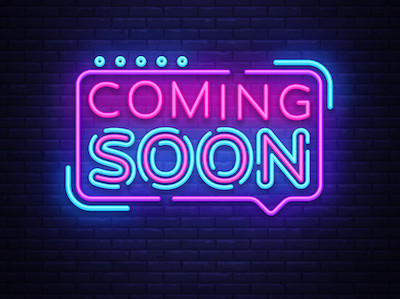 coming soon in neon sign lettering